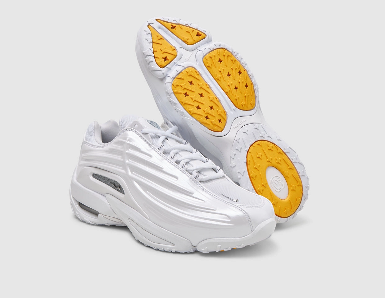 Nike NOCTA Hot Step 2 White / Chrome - University Gold